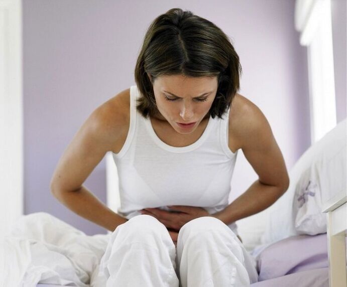 A woman worried about the symptoms of worm disease